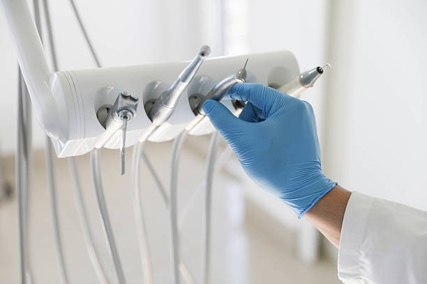 Professional Tooth Extraction technician working in Tigard, OR